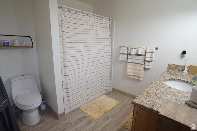 6835 S Larabrook Way, West Jordan, UT 84084 - full bathroom with a shower with shower curtain, toilet, wood finished floors, and vanity
