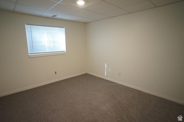 6835 S Larabrook Way, West Jordan, UT 84084 - spare room with baseboards, a drop ceiling, and dark colored carpet