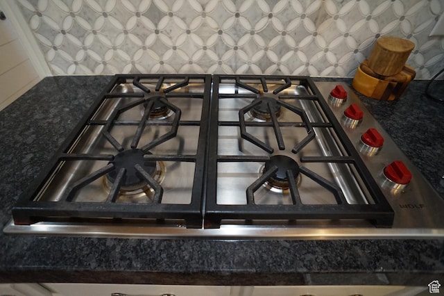 6835 S Larabrook Way, West Jordan, UT 84084 - details featuring stainless steel gas stovetop and dark countertops
