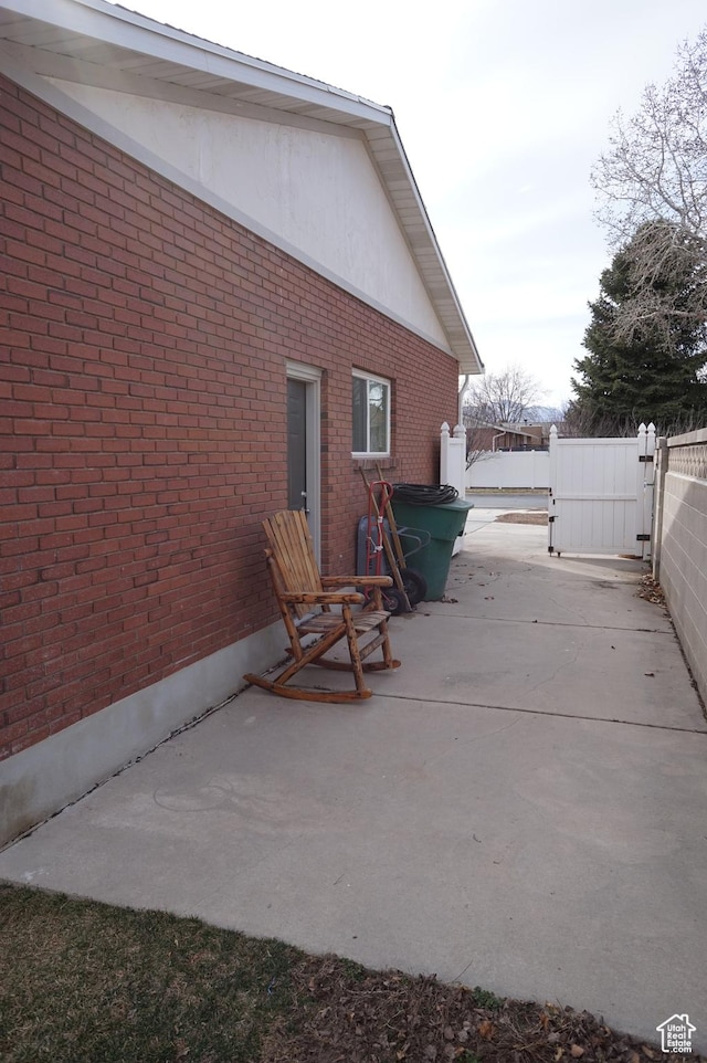 6835 S Larabrook Way, West Jordan, UT 84084 - view of patio / terrace featuring fence