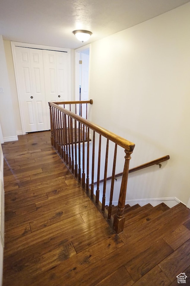 6835 S Larabrook Way, West Jordan, UT 84084 - stairway featuring baseboards and hardwood / wood-style flooring