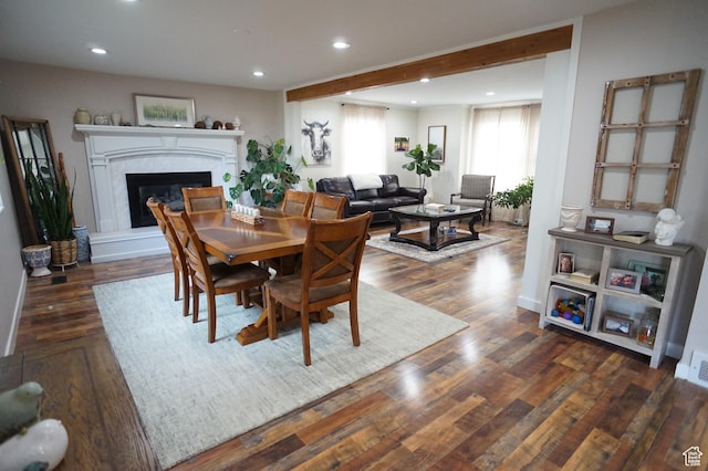 6835 S Larabrook Way, West Jordan, UT 84084 - dining area with recessed lighting, a glass covered fireplace, and dark wood-style floors