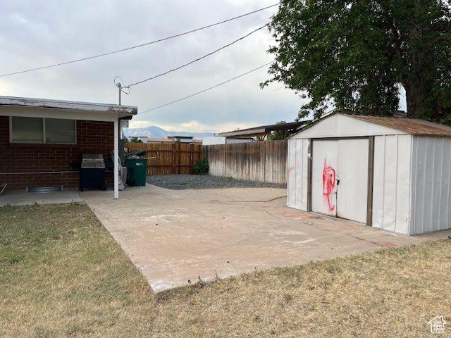 1993 W 4200 S, Roy, UT 84067 - view of yard with a patio area and a shed