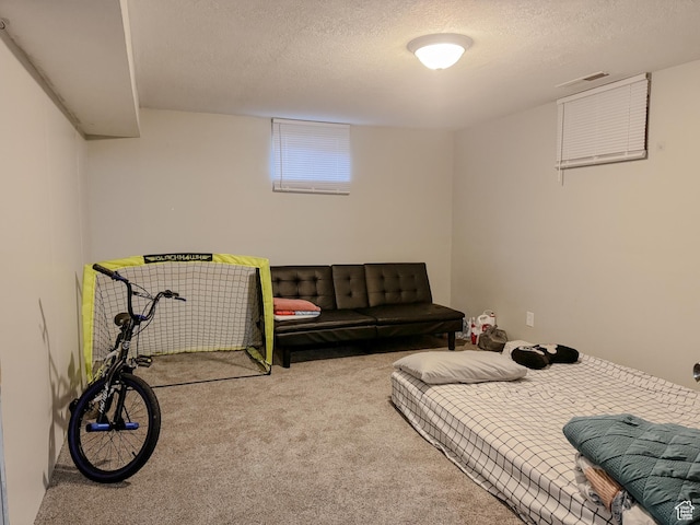 1993 W 4200 S, Roy, UT 84067 - bedroom featuring visible vents, carpet floors, and a textured ceiling