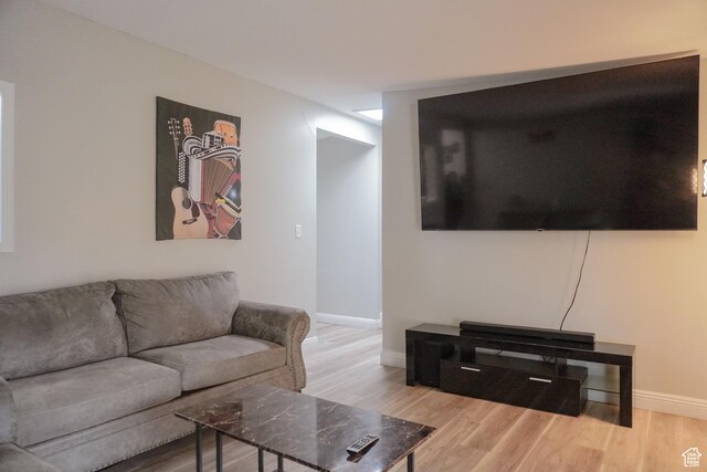 1993 W 4200 S, Roy, UT 84067 - living room featuring wood finished floors and baseboards