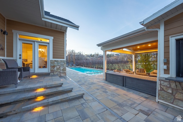 view of patio / terrace featuring an outdoor pool