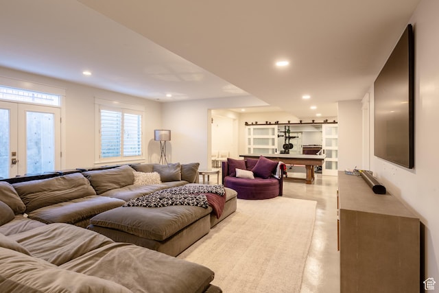 living room with wood finished floors and recessed lighting