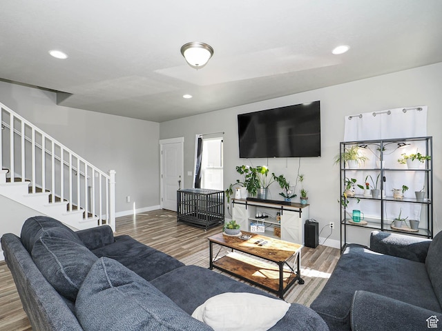 3765 E Cunninghill Dr, Eagle Mountain, UT 84005 - living room with recessed lighting, stairway, baseboards, and wood finished floors