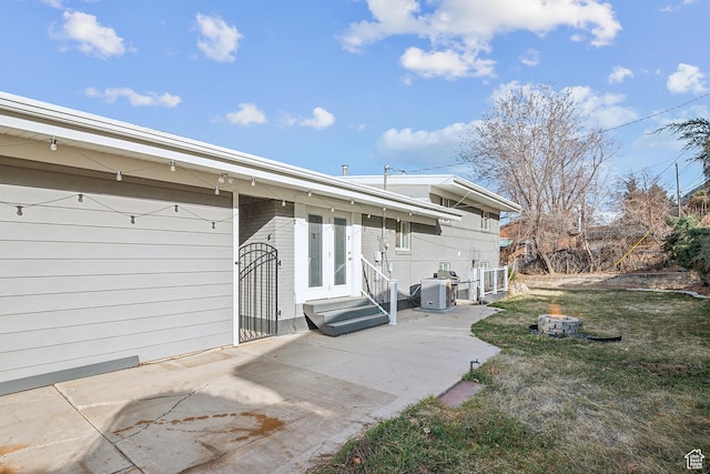 118 N Iowa Ave, Ogden, UT 84404 - back of house with a patio, central AC, and entry steps