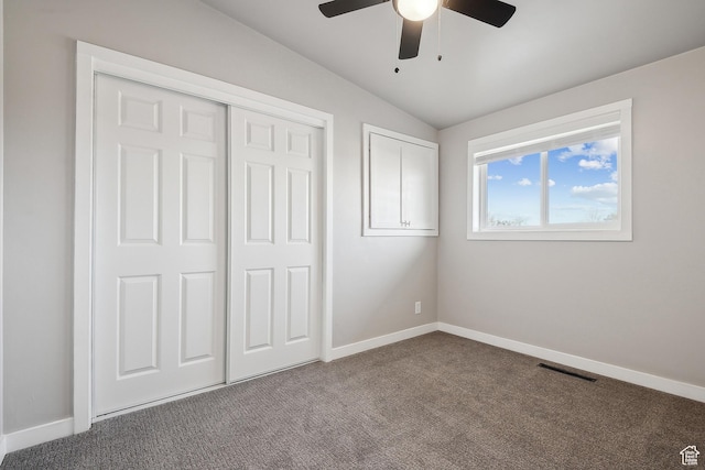 118 N Iowa Ave, Ogden, UT 84404 - unfurnished bedroom with a ceiling fan, visible vents, baseboards, vaulted ceiling, and dark colored carpet