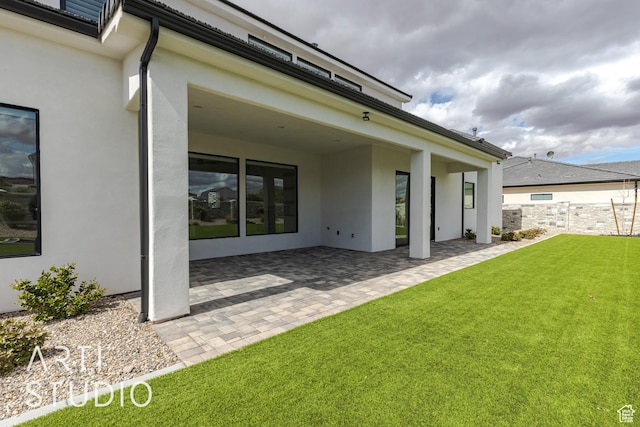3823 S Kennedy Ln, Washington, UT 84780 - back of property featuring a patio, a yard, cooling unit, and stucco siding