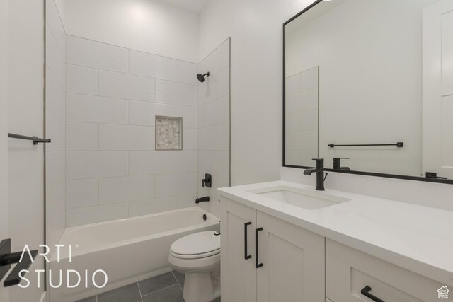 3823 S Kennedy Ln, Washington, UT 84780 - bathroom with tub / shower combination, toilet, vanity, and tile patterned flooring