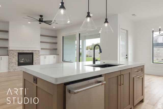 3823 S Kennedy Ln, Washington, UT 84780 - kitchen with a sink, open shelves, stainless steel dishwasher, and light wood-style flooring