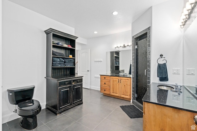 5798 W 11350 N, Highland, UT 84003 - full bath with toilet, recessed lighting, vanity, tile patterned floors, and a stall shower
