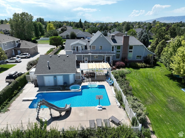 5798 W 11350 N, Highland, UT 84003 - view of pool with a diving board, a yard, fence private yard, a patio area, and a fenced in pool