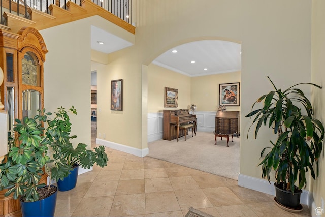 5798 W 11350 N, Highland, UT 84003 - corridor with baseboards, ornamental molding, recessed lighting, arched walkways, and light colored carpet
