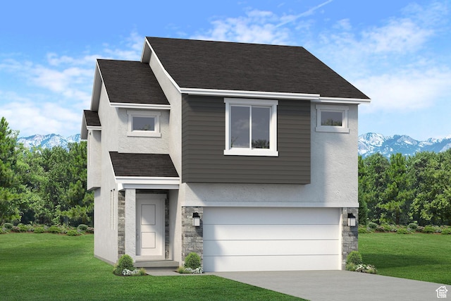 contemporary house with a mountain view, an attached garage, and a front yard