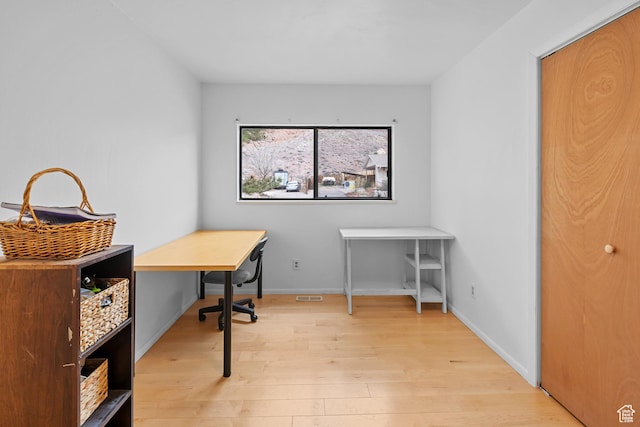 252 Hillside Dr, Moab, UT 84532 - office featuring visible vents, baseboards, and light wood finished floors