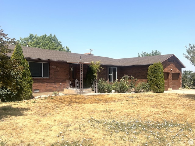 5862 S 3200 W, Lake Shore, UT 84660 - single story home with brick siding, crawl space, and a garage