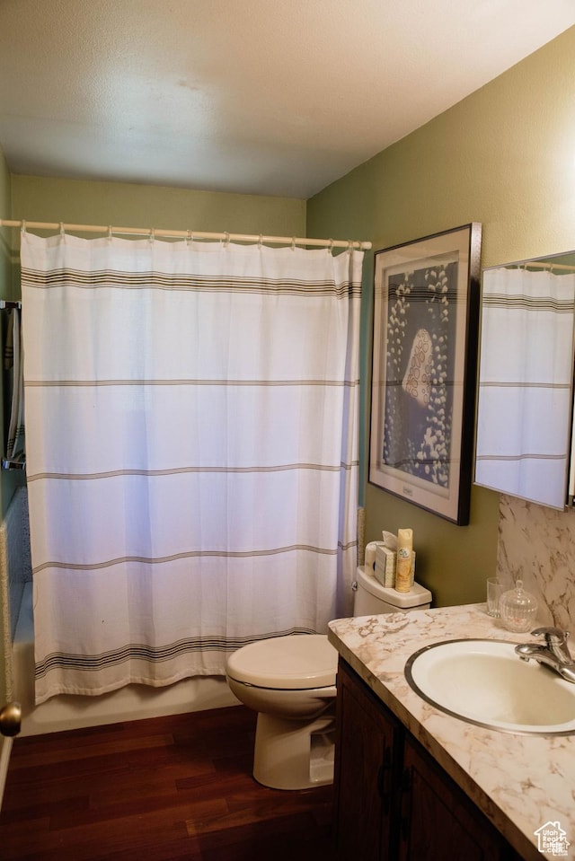 5862 S 3200 W, Lake Shore, UT 84660 - full bathroom featuring shower / tub combo with curtain, toilet, wood finished floors, and vanity