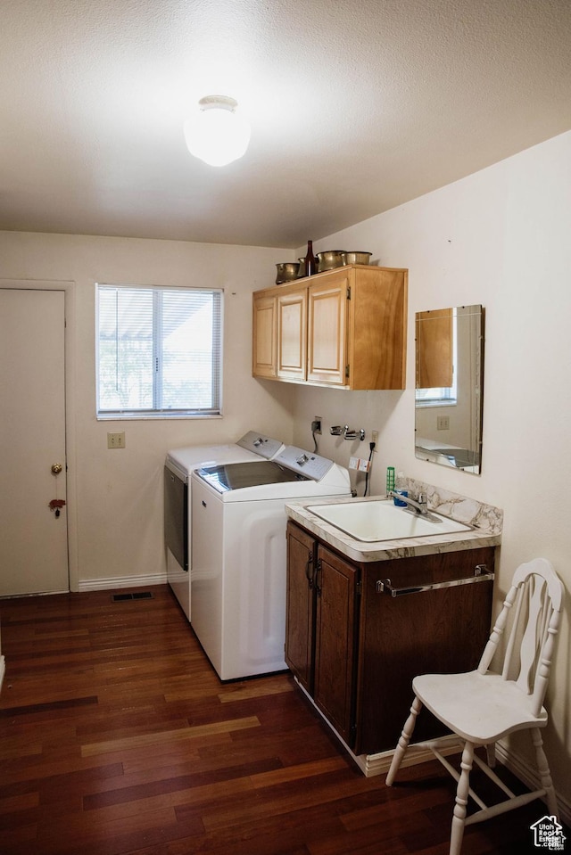 5862 S 3200 W, Lake Shore, UT 84660 - laundry area with visible vents, dark wood-type flooring, washer and dryer, a sink, and cabinet space
