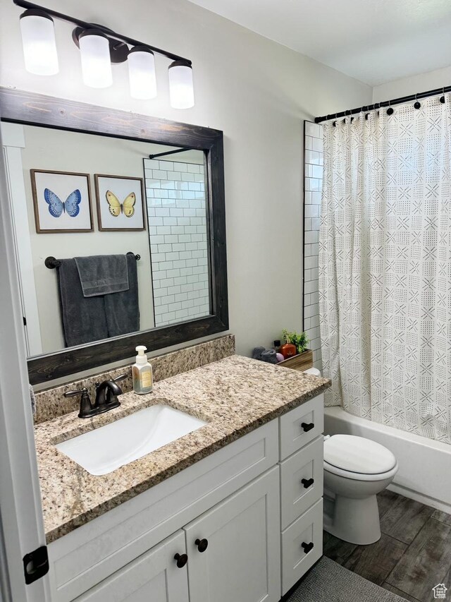 5517 S 6800 W, Hooper, UT 84315 - full bath with shower / bathtub combination with curtain, toilet, wood finished floors, and vanity