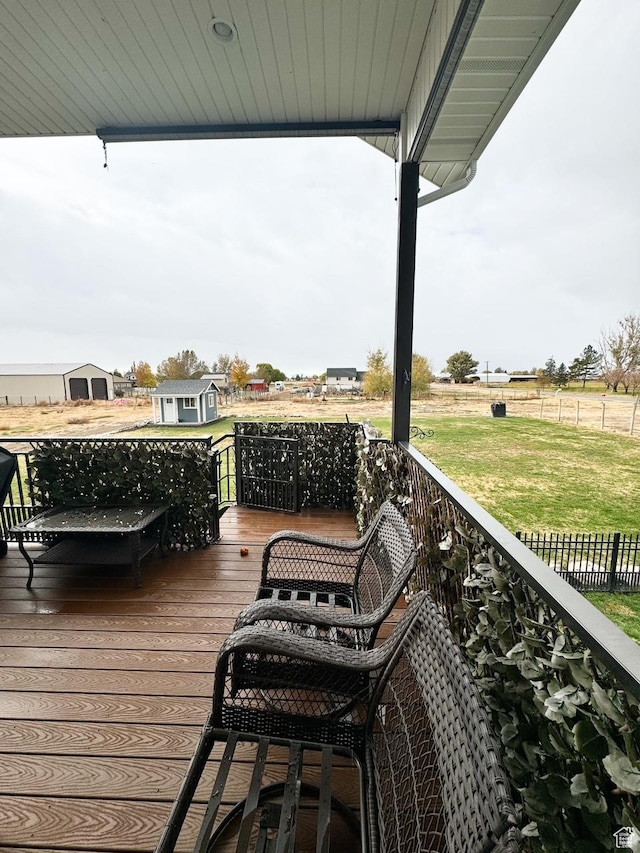 5517 S 6800 W, Hooper, UT 84315 - wooden deck with an outbuilding, a lawn, and a shed