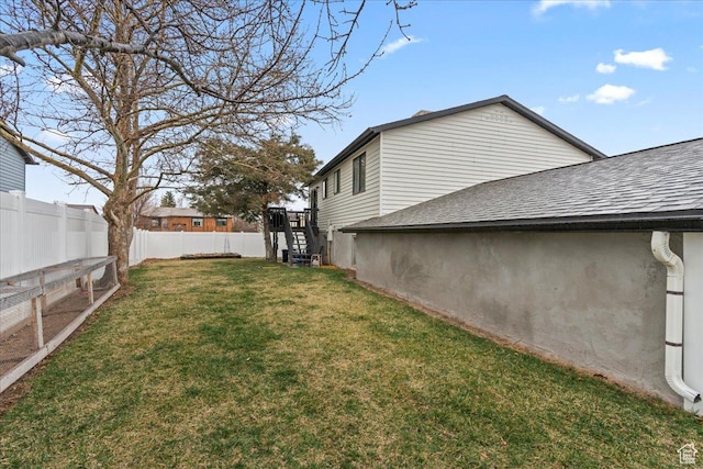view of yard with fence