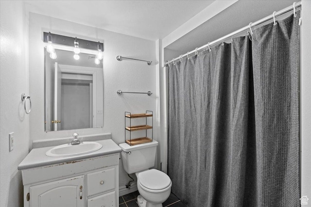 full bath featuring tile patterned floors, curtained shower, toilet, and vanity