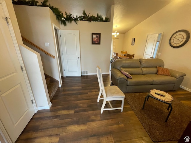 763 S 1500 W, Logan, UT 84321 - living room with visible vents, a chandelier, stairway, lofted ceiling, and wood finished floors