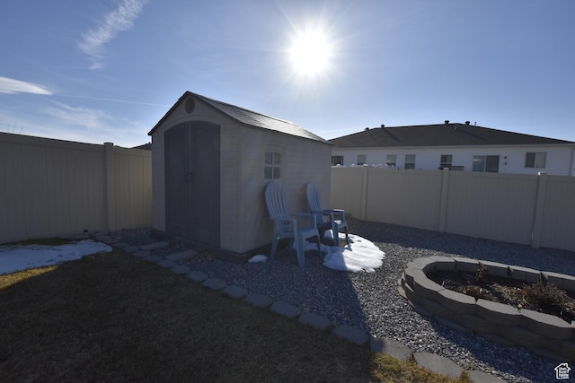 342 S 1250 E, Hyrum, UT 84319 - fenced backyard with a fire pit