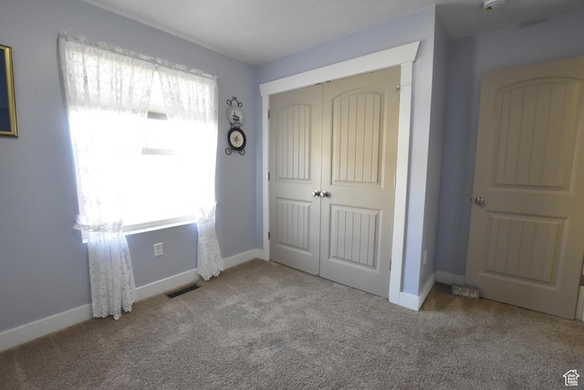 342 S 1250 E, Hyrum, UT 84319 - unfurnished bedroom with carpet floors, a closet, and baseboards