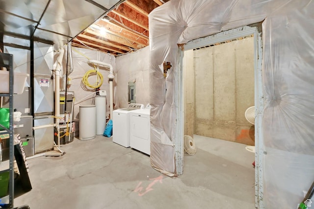 unfinished below grade area with washer and dryer and secured water heater