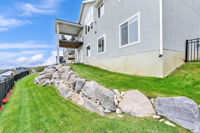 view of yard featuring stairs and fence
