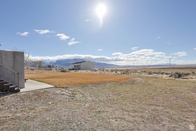 2409 W Rim Rock Dr, Stockton, UT 84071 - view of yard with a rural view and a mountain view