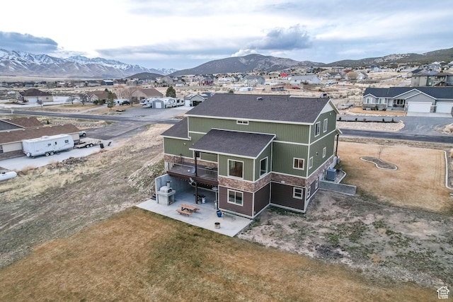 2409 W Rim Rock Dr, Stockton, UT 84071 - bird's eye view with a residential view and a mountain view