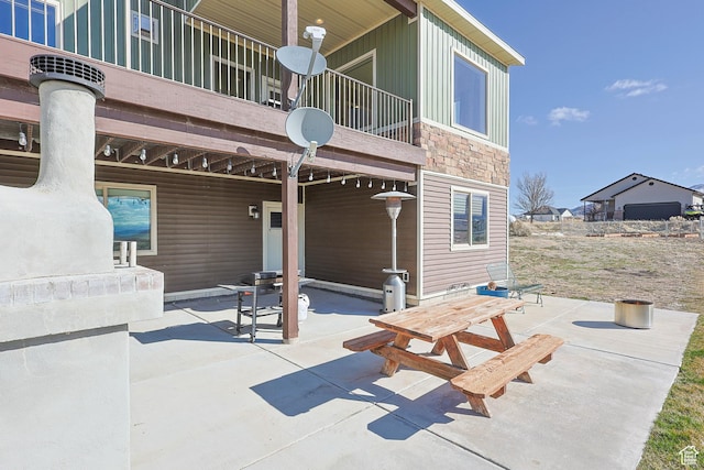 2409 W Rim Rock Dr, Stockton, UT 84071 - view of patio / terrace featuring a balcony