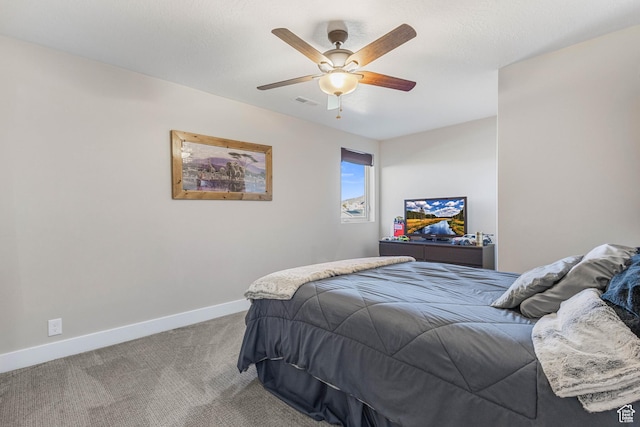 2409 W Rim Rock Dr, Stockton, UT 84071 - bedroom with visible vents, ceiling fan, baseboards, and carpet