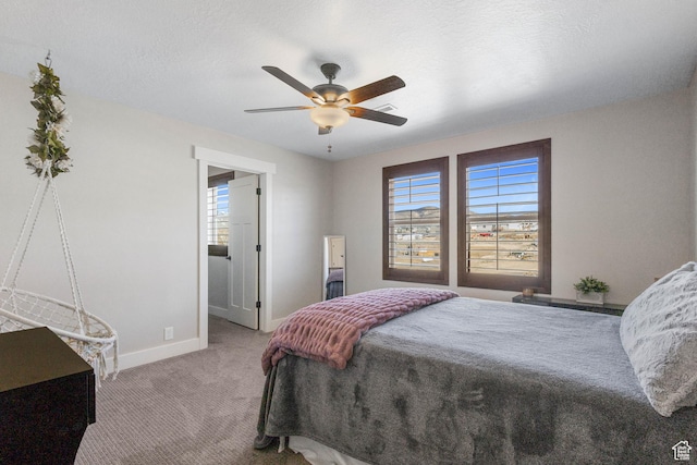 2409 W Rim Rock Dr, Stockton, UT 84071 - carpeted bedroom with a textured ceiling, a ceiling fan, and baseboards