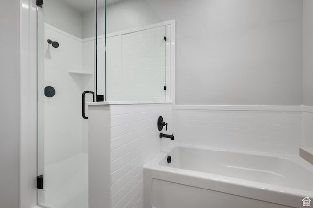6317 W Cape Ridge Ln, West Valley City, UT 84128 - full bath featuring a garden tub and a stall shower