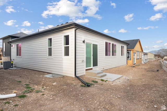 6317 W Cape Ridge Ln, West Valley City, UT 84128 - rear view of house featuring central air condition unit