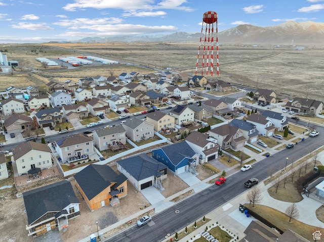 6317 W Cape Ridge Ln, West Valley City, UT 84128 - aerial view with a mountain view and a residential view