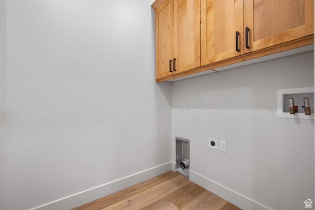 6317 W Cape Ridge Ln, West Valley City, UT 84128 - laundry room with light wood finished floors, baseboards, hookup for a washing machine, cabinet space, and hookup for an electric dryer