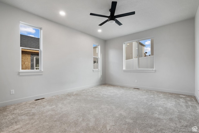 6317 W Cape Ridge Ln, West Valley City, UT 84128 - carpeted spare room featuring visible vents, recessed lighting, baseboards, and ceiling fan