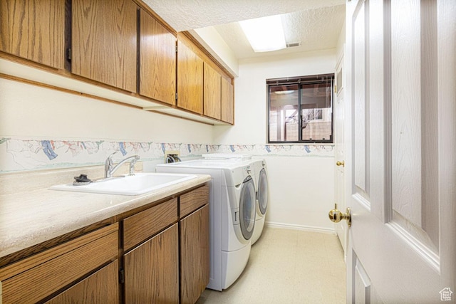 161 S Canyon Rd E, Parowan, UT 84761 - washroom with visible vents, independent washer and dryer, a sink, cabinet space, and light floors