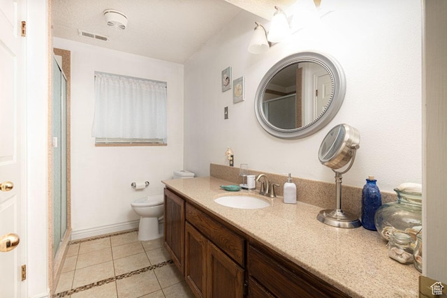 161 S Canyon Rd E, Parowan, UT 84761 - bathroom featuring tile patterned flooring, visible vents, a shower stall, and vanity