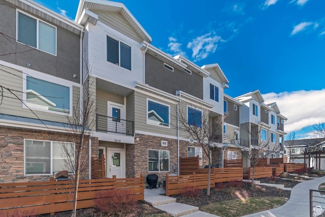 view of property with a residential view