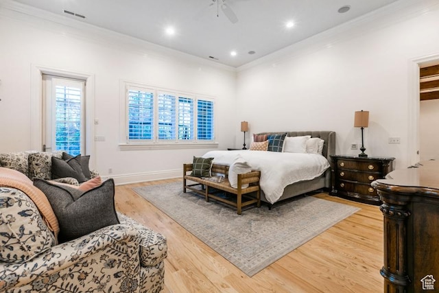 bedroom featuring recessed lighting, visible vents, light wood-type flooring, and ornamental molding