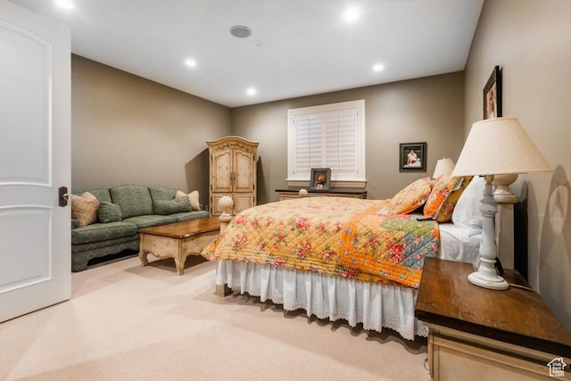 bedroom featuring recessed lighting and light colored carpet