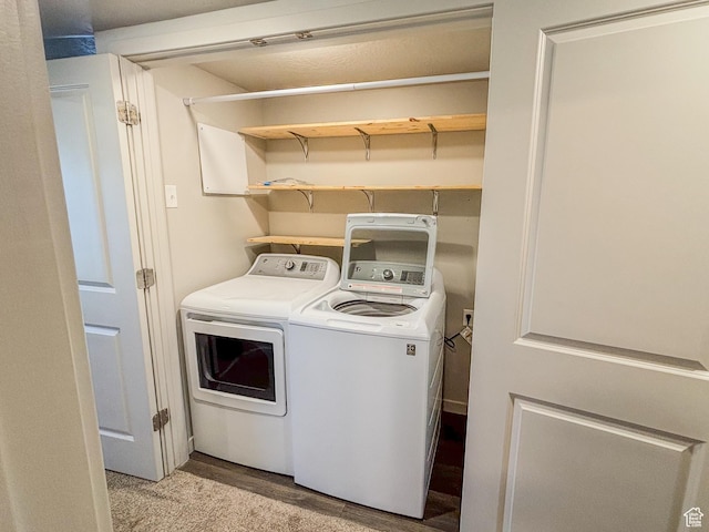 1700 S Sandhill Unit H203, Orem, UT 84058 - washroom featuring laundry area, light wood-style flooring, and washer and clothes dryer